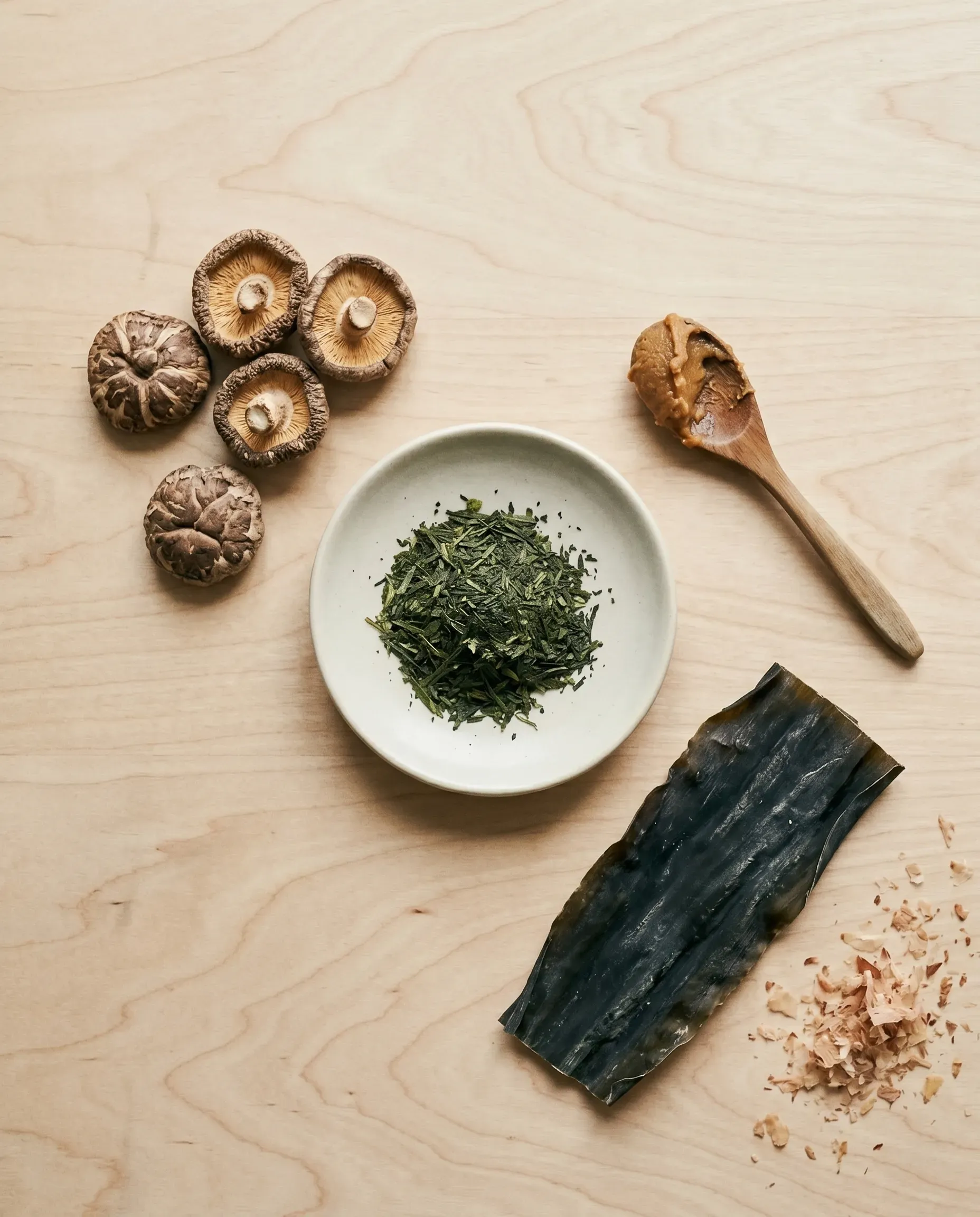 Japanese pantry ingredients laid out on a wooden surface